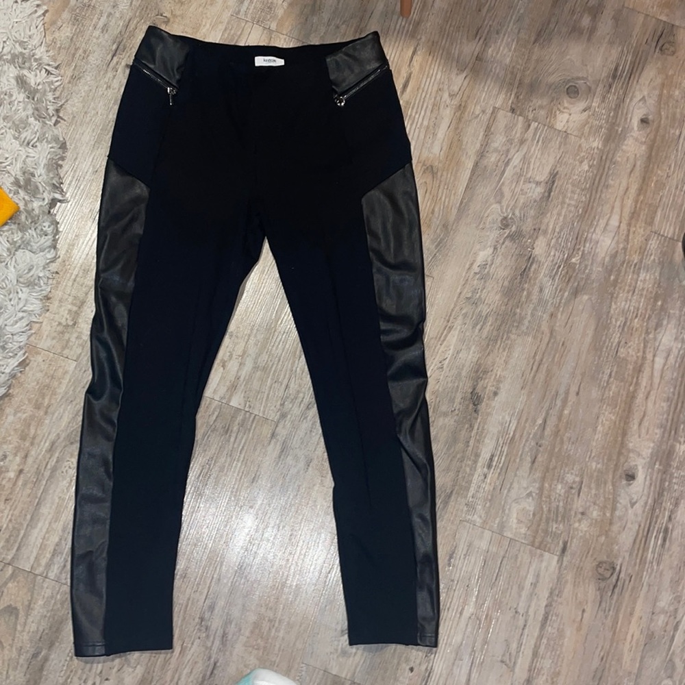 Leggings that look like black jeans, with a leather stripe.